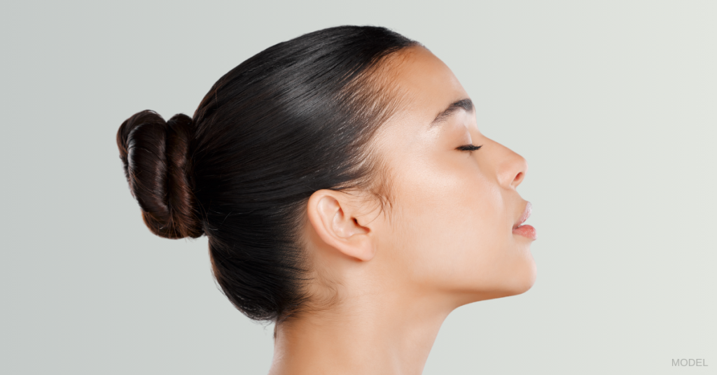 A woman's face side profile with their eyes closed. (Model)